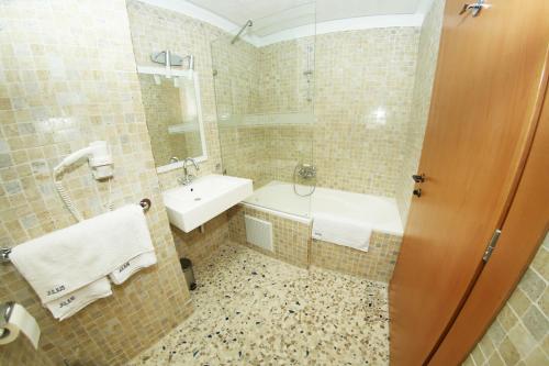 Ett badrum på Hotel Julius