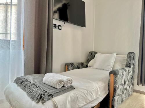 Katil atau katil-katil dalam bilik di Kelly's Rooms