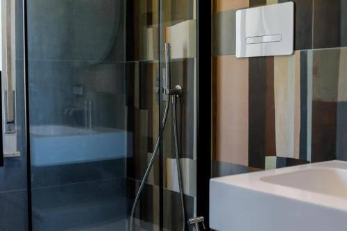 Koupelna v ubytování VentunoDodici Oliveri Apartments
