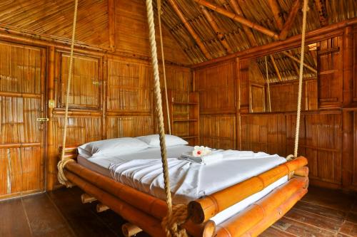 Hostal La Finquitaにあるベッド