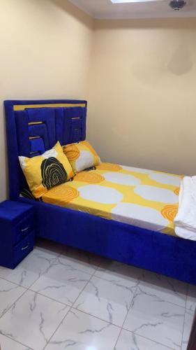 Ένα ή περισσότερα κρεβάτια σε δωμάτιο στο Yamis apartment