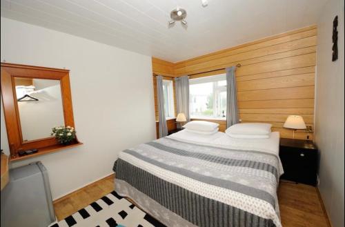 Rúm í herbergi á Dream Guesthouse