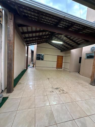 an empty hallway of a building with a ceiling at Casa 3Q accesso ao Daia, Havan, Unievangelica in Anápolis