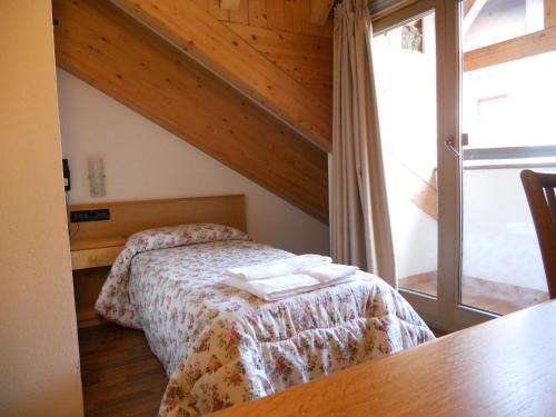 Katil atau katil-katil dalam bilik di Hotel Orsa Maggiore