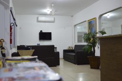 TV a/nebo společenská místnost v ubytování Richard Hotel