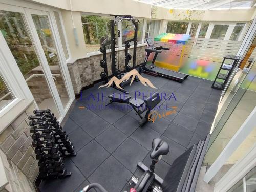 an overhead view of a gym with exercise equipment at Laje de Pedra Mountain VillagePrime in Canela