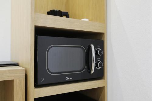 Μια τηλεόραση ή/και κέντρο ψυχαγωγίας στο BrownDot Hotel Hongseong Naepo