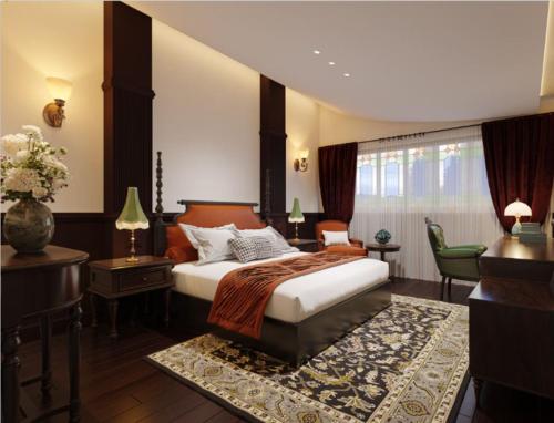 a bedroom with a bed and a desk and a chair at Daling Mansion, Wenshu Academy, Chengdu in Chengdu