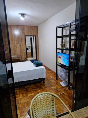 Postel nebo postele na pokoji v ubytování Loft Meu Cantinho