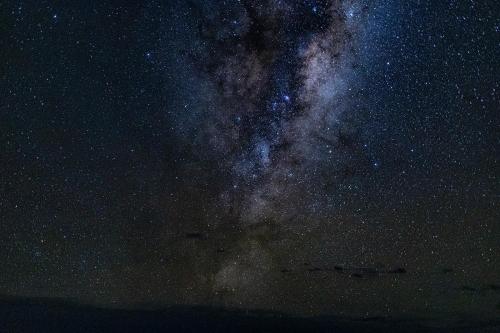 a starry night with the milky way at Oceanview Suite in Hapuku