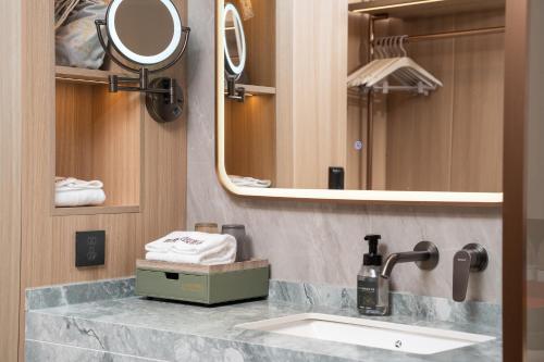 Un baño de Yaman Garden Hotel 雅缦花园酒店
