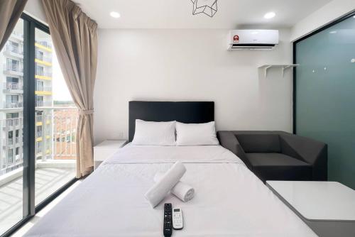 Ένα ή περισσότερα κρεβάτια σε δωμάτιο στο DK Impian Luxury Condominiums, Subang Airport - Smarthome