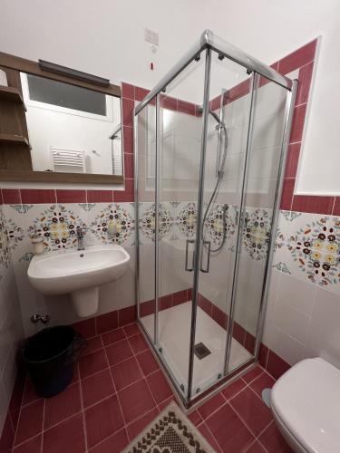 a bathroom with a shower and a sink at Oasi Cuore in Castellammare di Stabia