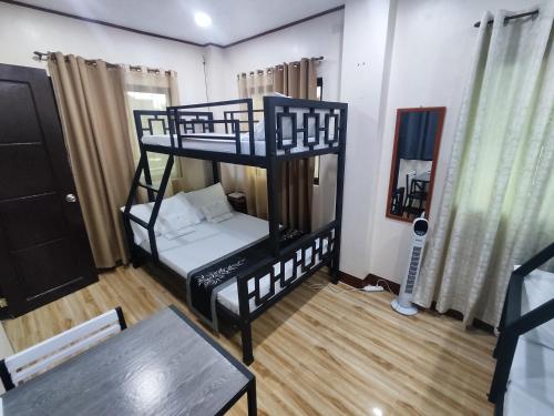 Postel nebo postele na pokoji v ubytování Casita Agnes Guest House