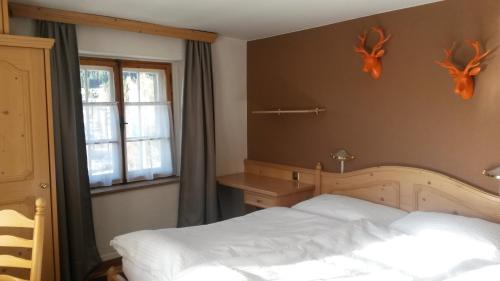 Postel nebo postele na pokoji v ubytování Hotel Danis