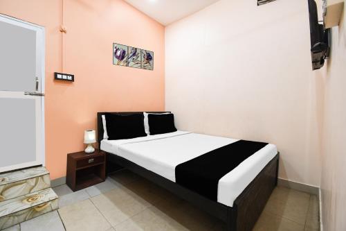 Giường trong phòng chung tại Super Hotel O Sofitel Hotel