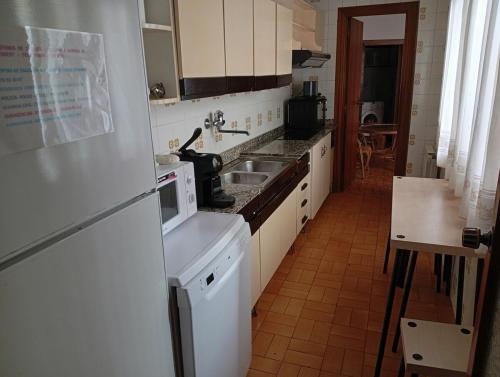 Η κουζίνα ή μικρή κουζίνα στο central apartment in Caspe