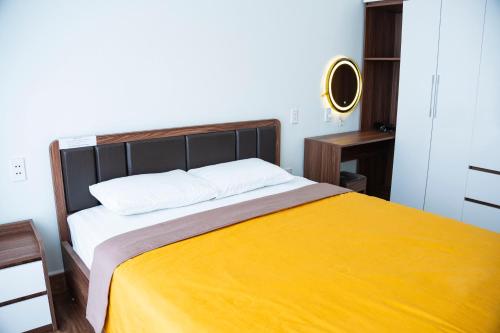 Postel nebo postele na pokoji v ubytování Thảo Hân Hotel