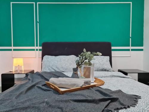 Ένα ή περισσότερα κρεβάτια σε δωμάτιο στο Abz Apartment @ Solstice
