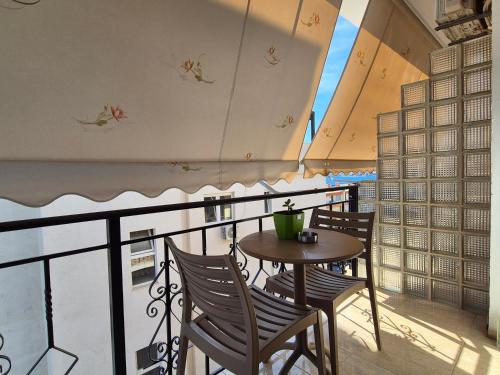 ระเบียงหรือลานระเบียงของ Augusto Rooms