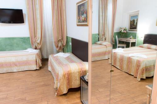 Letto o letti in una camera di Residenza Ki