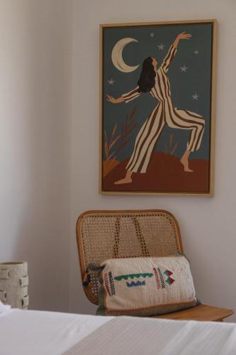 Ένα ή περισσότερα κρεβάτια σε δωμάτιο στο Siora of Paros - Ammiralis & Castelis