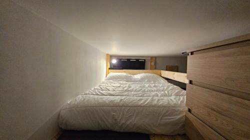 Postel nebo postele na pokoji v ubytování Studio cocon