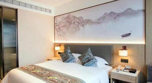 Cama o camas de una habitación en Nanning Yongzhou Hotel