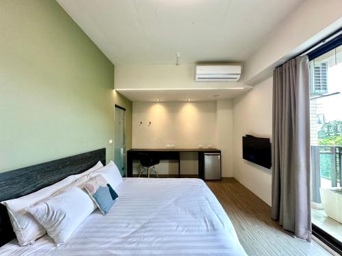 Una cama o camas en una habitación de Mo