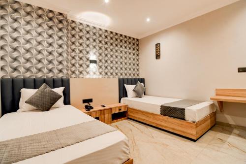 Hotel Seventy Sevenにあるベッド