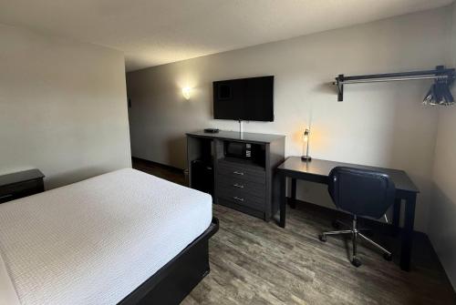 Letto o letti in una camera di Days Inn by Wyndham Orange Park/Jacksonville