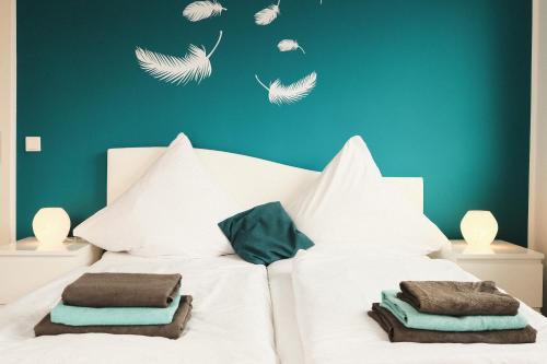 Katil atau katil-katil dalam bilik di Apartment mit Wohnflair
