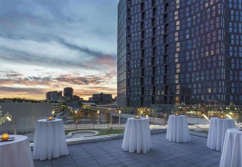 a row of tables on the roof of a building at Hyatt Regency Tysons Corner Center in Tysons Corner