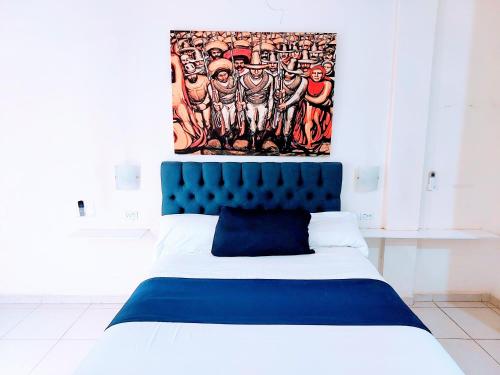 Ένα ή περισσότερα κρεβάτια σε δωμάτιο στο Apartamento 12 con dos camas , a 200 mts del vado del rio , cerca del centro de gobierno , internet de alta velocidad