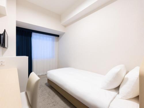 Televisyen dan/atau pusat hiburan di Brackets Hotel Osaka Hommachi