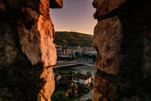 a view of a city from a window at Hotel Cara 28 in Skopje
