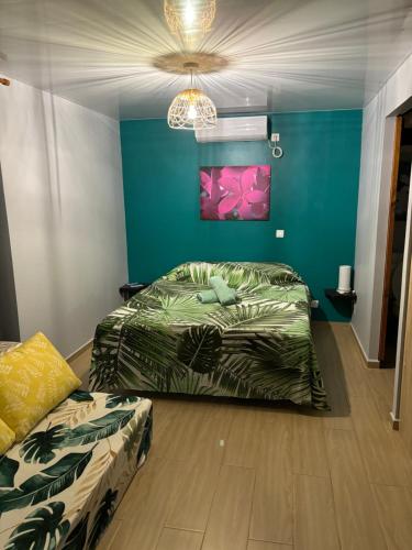 Postel nebo postele na pokoji v ubytování Rangi Pearl Lodge