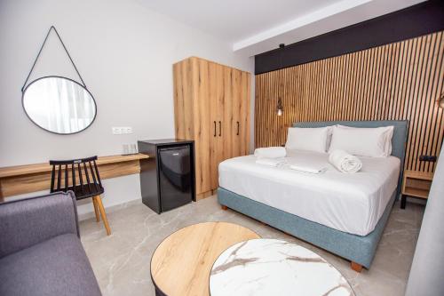 Ένα ή περισσότερα κρεβάτια σε δωμάτιο στο Konstantinoupolis Rooms