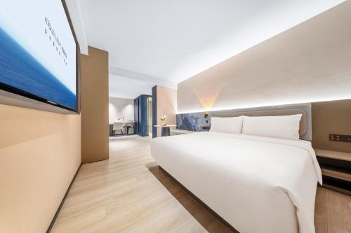 Postel nebo postele na pokoji v ubytování Atour Light Hotel Chengdu Kuanzhai Alley