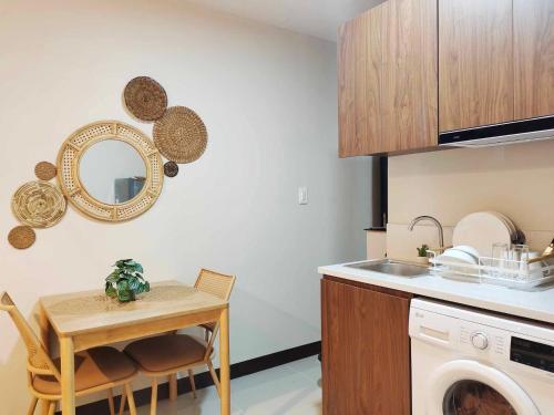 Η κουζίνα ή μικρή κουζίνα στο Aunt & Niece Condo Studio