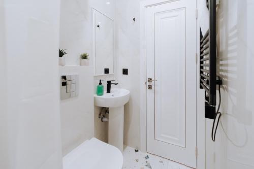 Koupelna v ubytování Chisinau City Center New Renovation 1BR