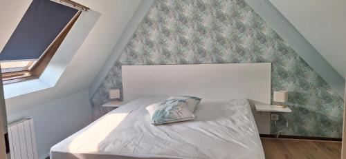 Postel nebo postele na pokoji v ubytování Gîte ramloc