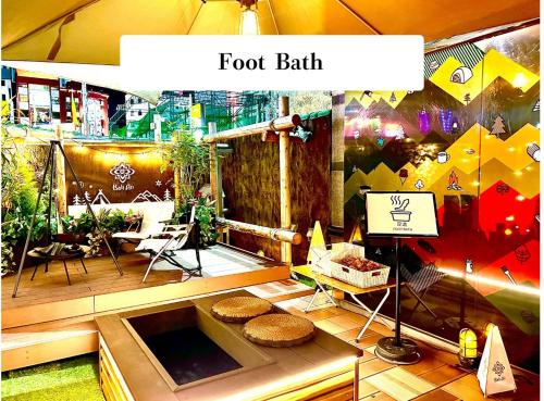 a food stall with some food on a table at Hotel BaliAn Resort Shinjuku Glamping in Tokyo