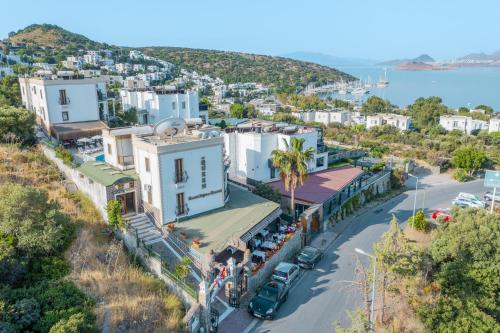 an aerial view of a city with a street and buildings at Queen Otel in Bodrum City