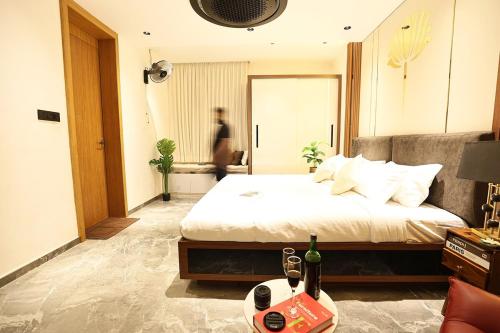 Katil atau katil-katil dalam bilik di Ekta Pool Farmstay Pollachi