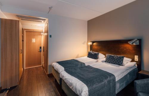 Postel nebo postele na pokoji v ubytování Hotel Haikko Manor & Spa