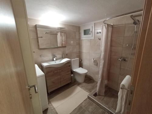 Ένα μπάνιο στο Cozy Apartment in Grevena