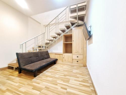 Χώρος καθιστικού στο Sari Panguripan RedPartner Near UGM