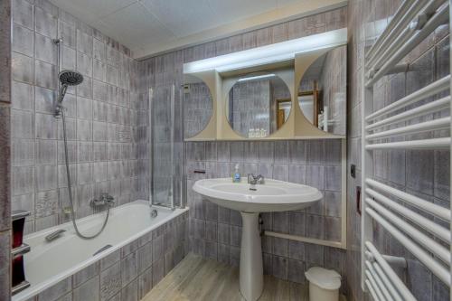 Koupelna v ubytování Les jardins du lac - OG IMMO