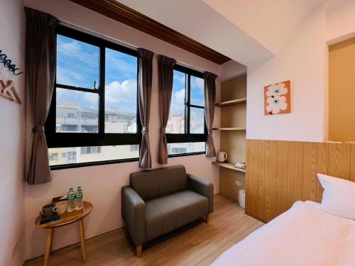 Postel nebo postele na pokoji v ubytování 有某行旅 yóu mǒu hostel